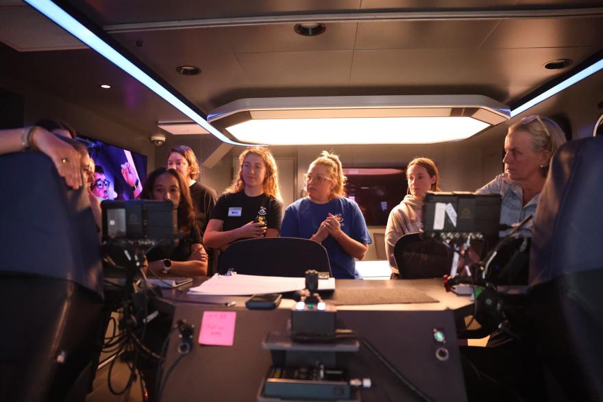 A group of scientists filming
