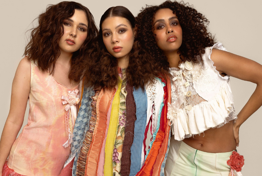 three models in bright clothes 