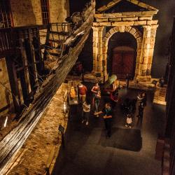 An aerial view of a tour group in the WA Shipwrecks Museum Batavia Gallery