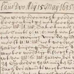 Close-up of an aged handwritten historical manuscript with faded ink, dense cursive text, and visible wear on parchment.
