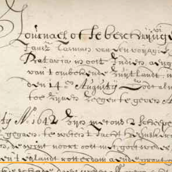 Close-up of an aged handwritten historical manuscript with faded ink, dense cursive text, and visible wear on parchment.