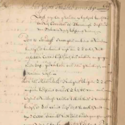 Close-up of an aged handwritten historical manuscript with faded ink, dense cursive text, and visible wear on parchment.
