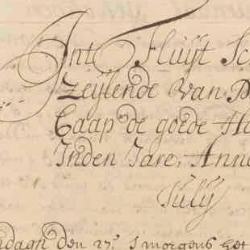 Close-up of an aged handwritten historical manuscript with faded ink, dense cursive text, and visible wear on parchment.