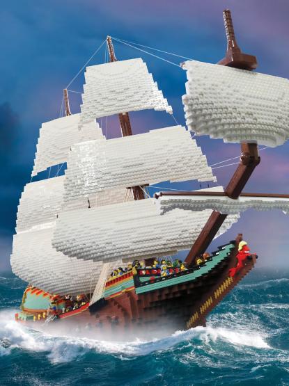 A poster featuring a LEGO ship sailing on the ocean