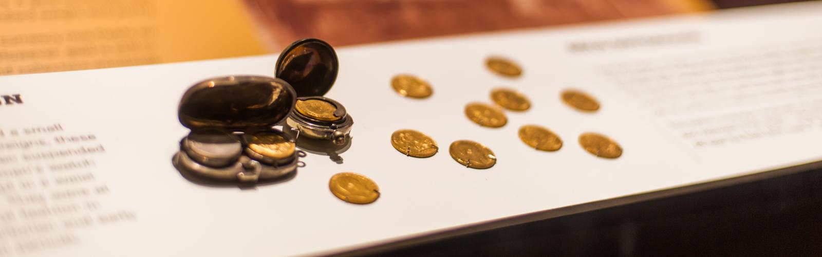 Gold coins in a showcase at the Museum of the Goldfields