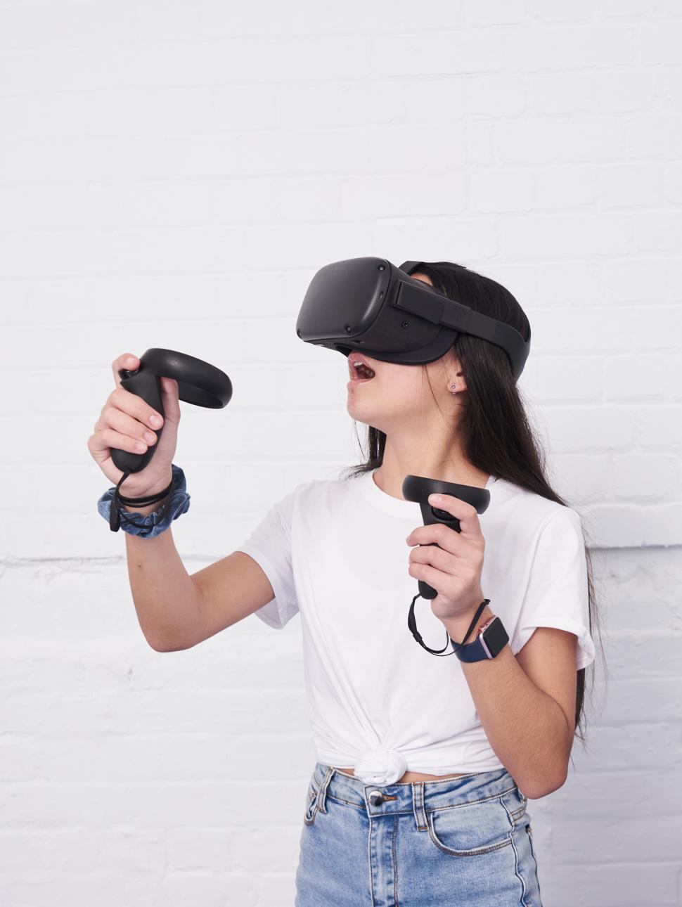 A young woman using virtual reality headset