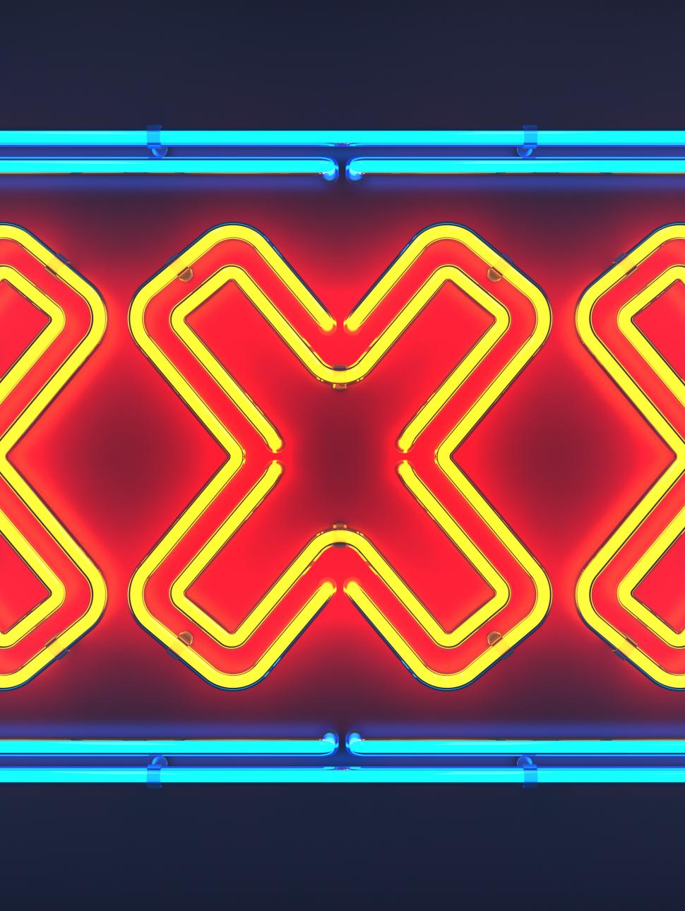 A neon sign with three X's