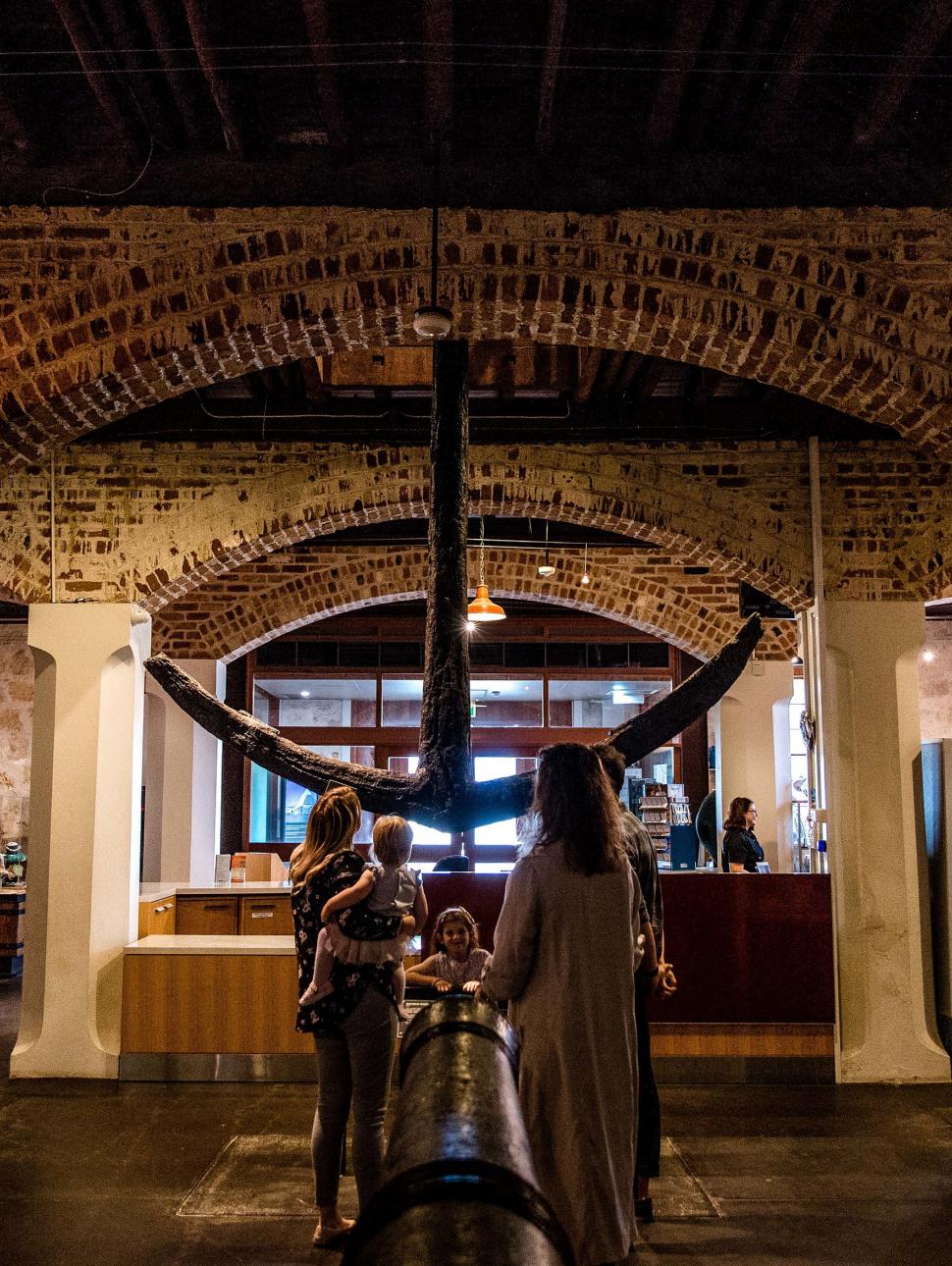 A family stand near the entrance of the WA Shipwrecks Museum