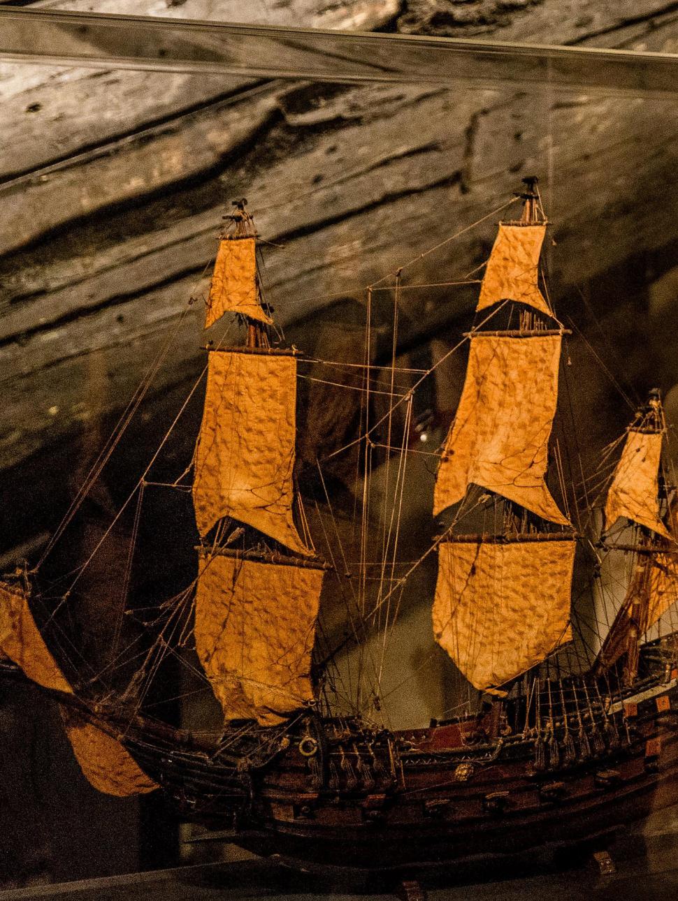 A model ship on display in a museum showcase