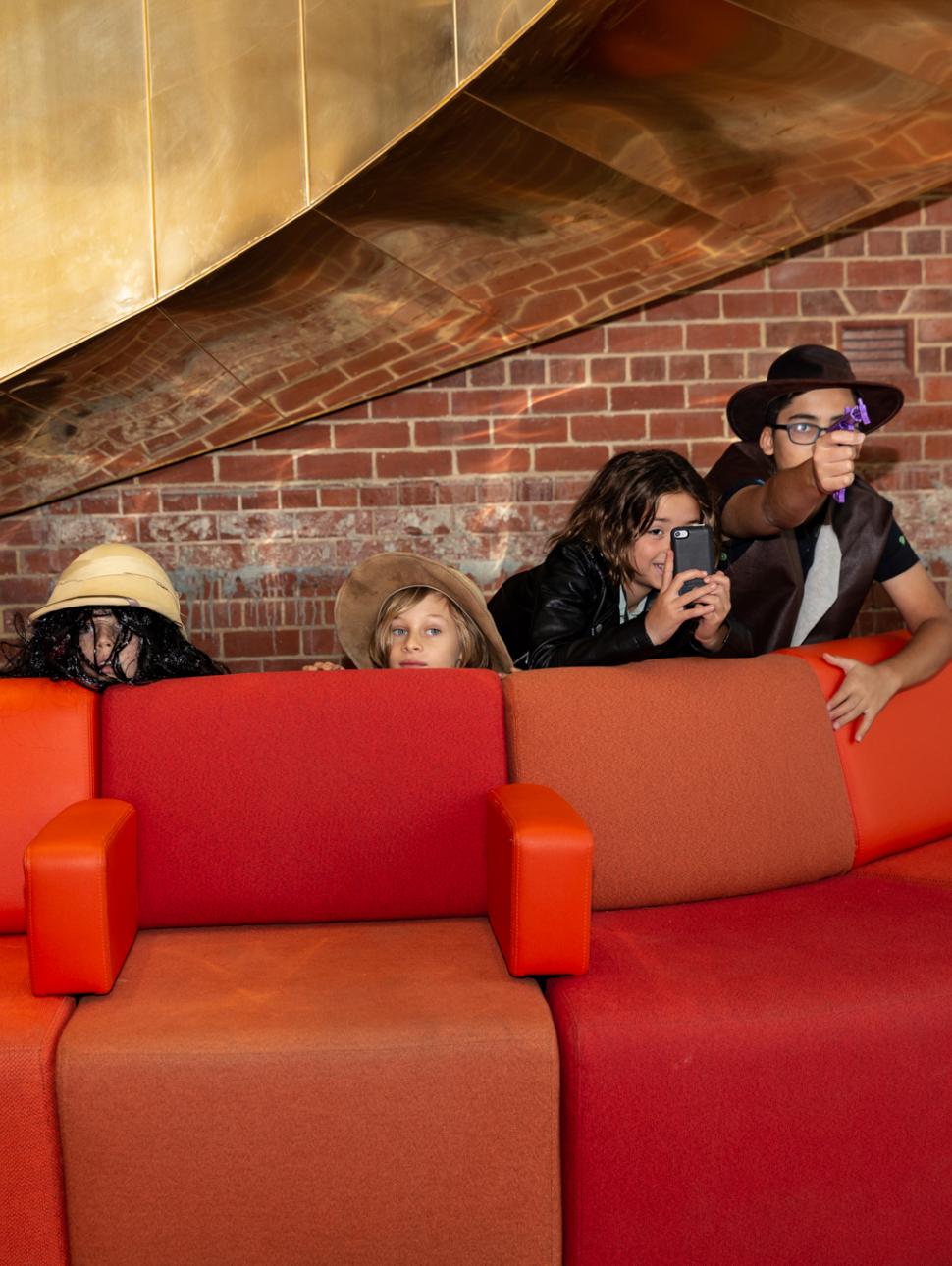 Children filming a movie inside the Museum