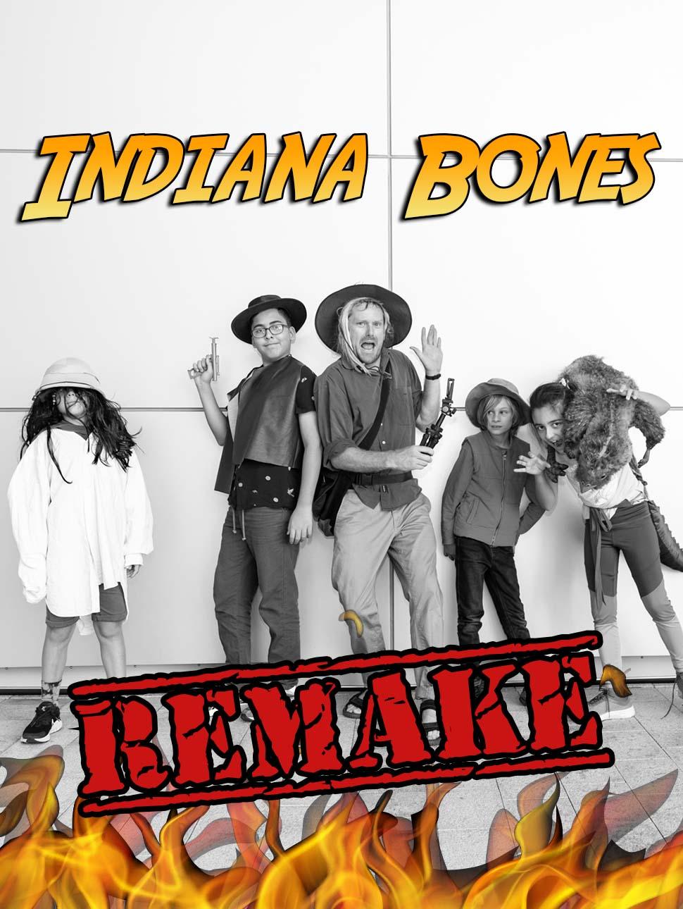 Black and white image of child actors with Archaeologist gear. Top text says 'Indiana Bones' and bottom text says 'Remake' with Photoshopped flames behind it