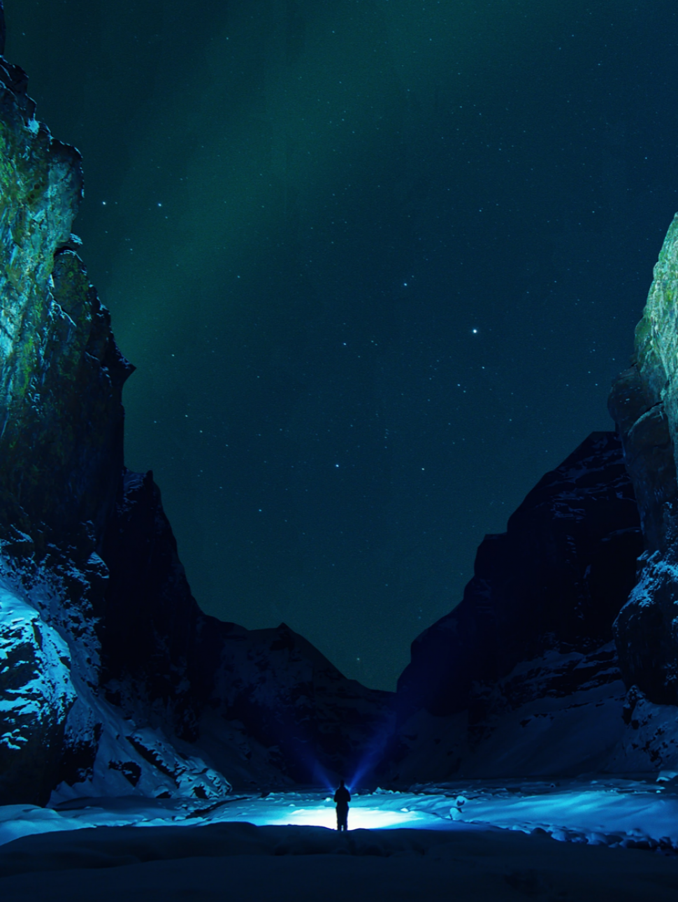 Image of person in the snow at night