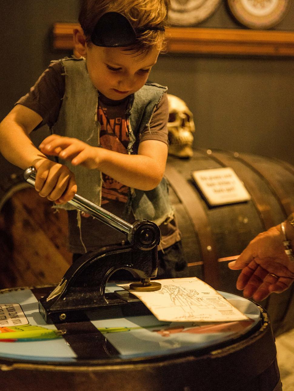 Young child plays with pirate equipment