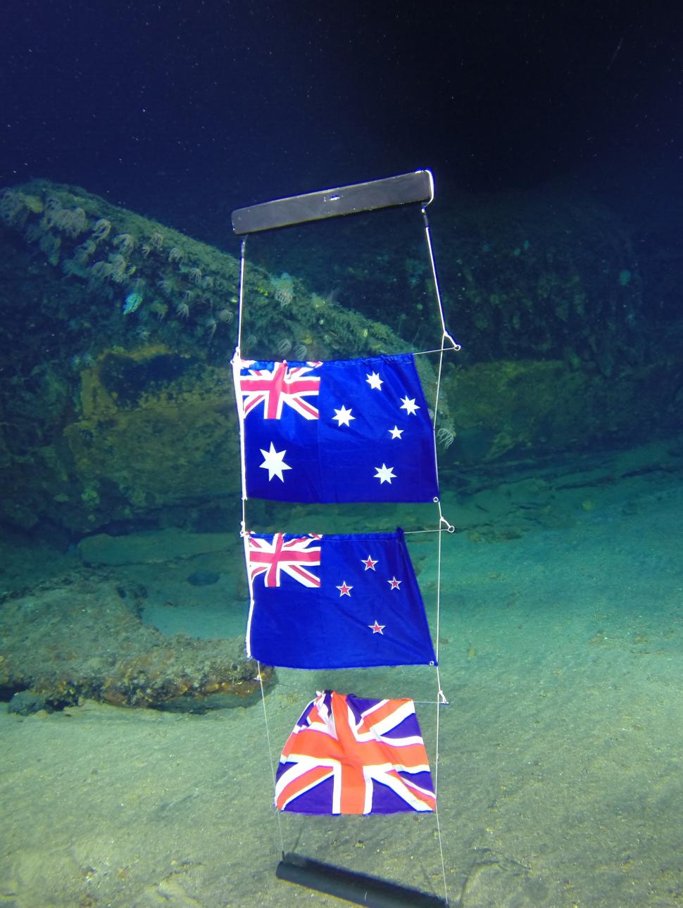Image of underwater flags commemortaing lost crew