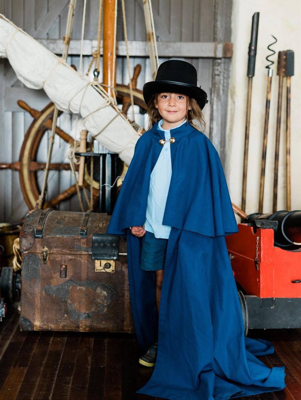 Young child dressed up in maritime clothing