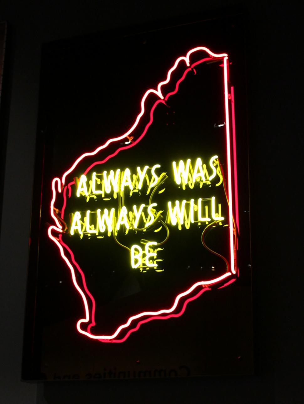Neon sign as Western Australian map with words 'always was always will be' inside the map