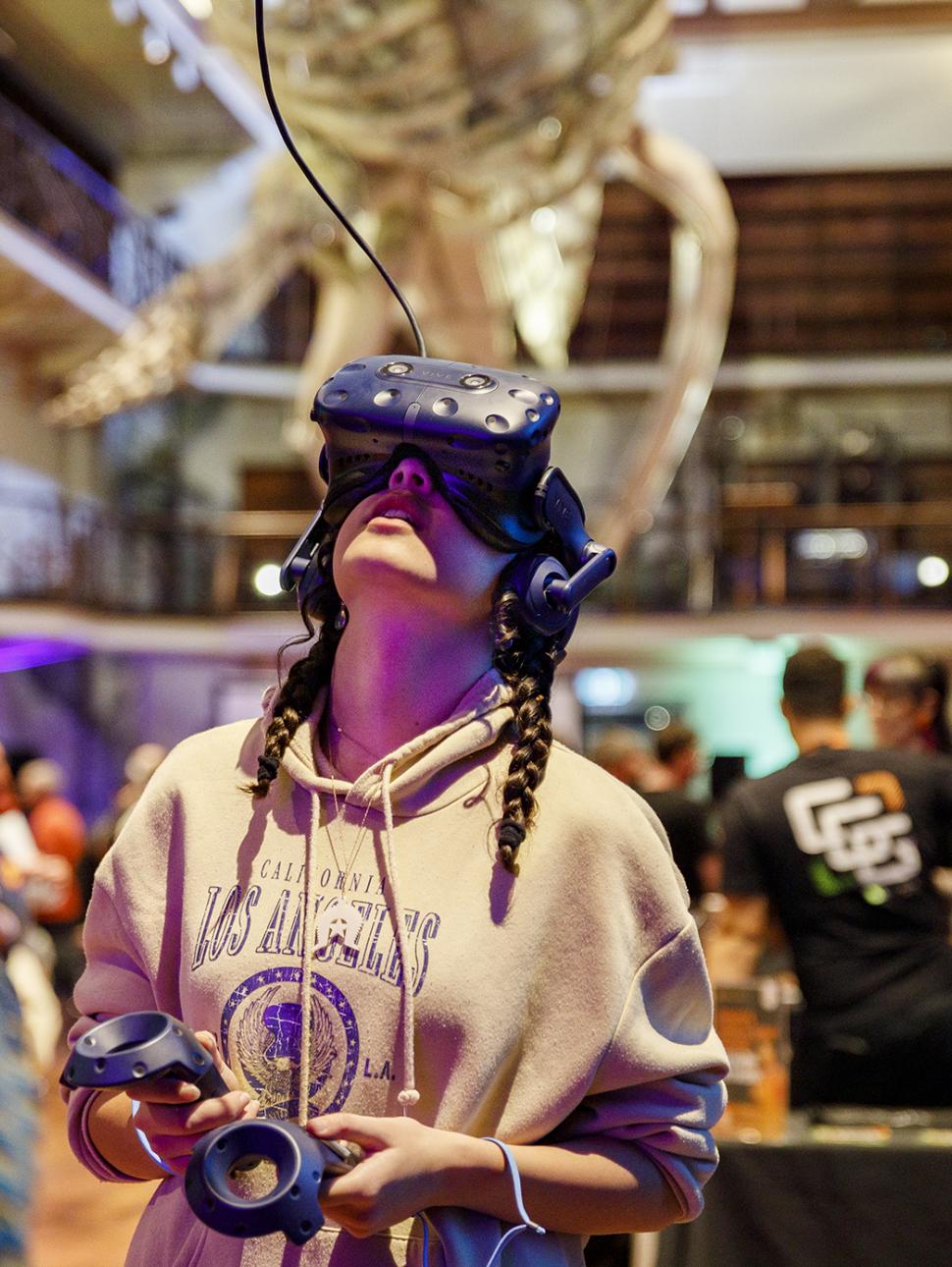 Image of a young child wearing a VR headset under Otto the Blue Whale