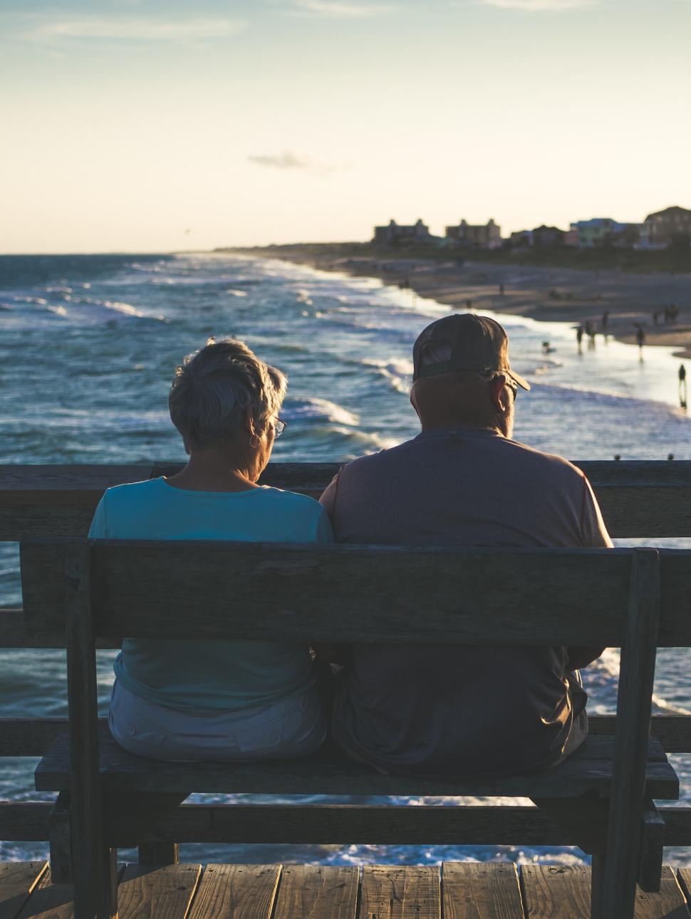 ocean sand coast man woman