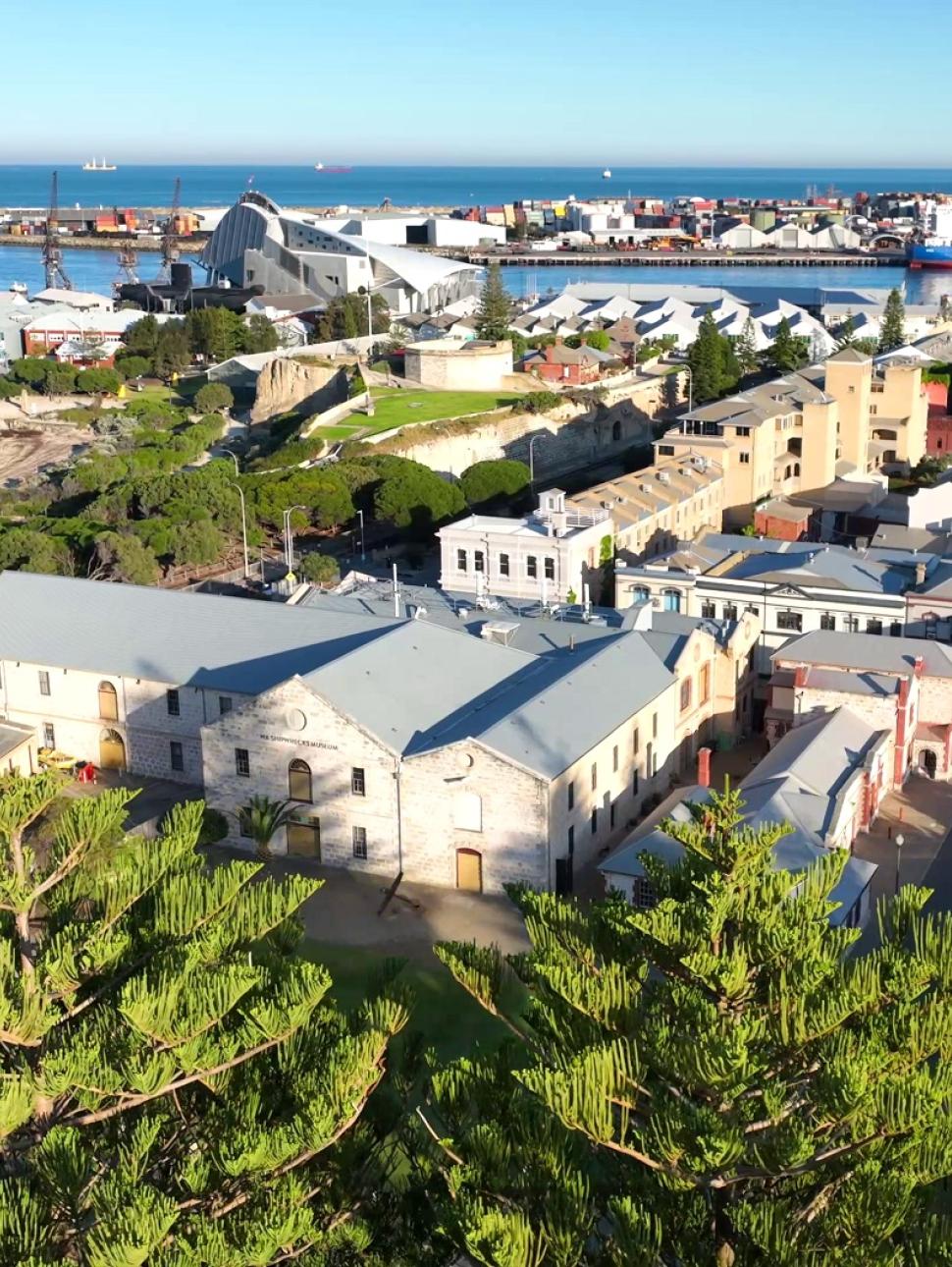 aerial view of Fremantle city with houses and landmarks. Harbour in the background