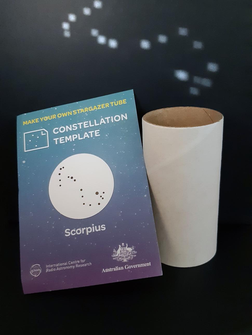 a flyer and a tube. background is a dark background with small stars