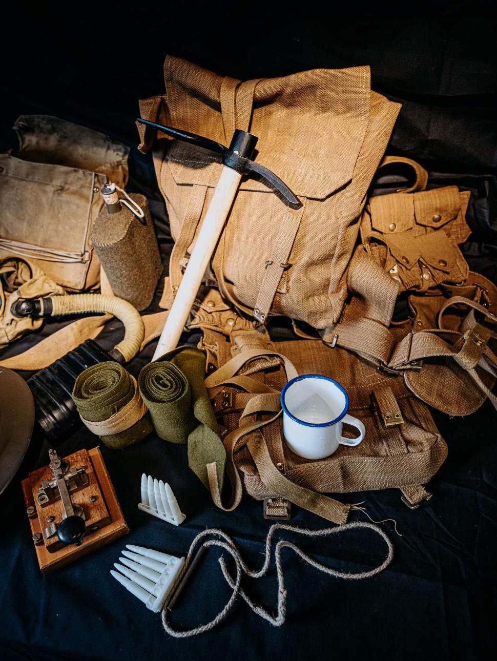 A handling kit featuring cups, backpacks and replicas from the first world war