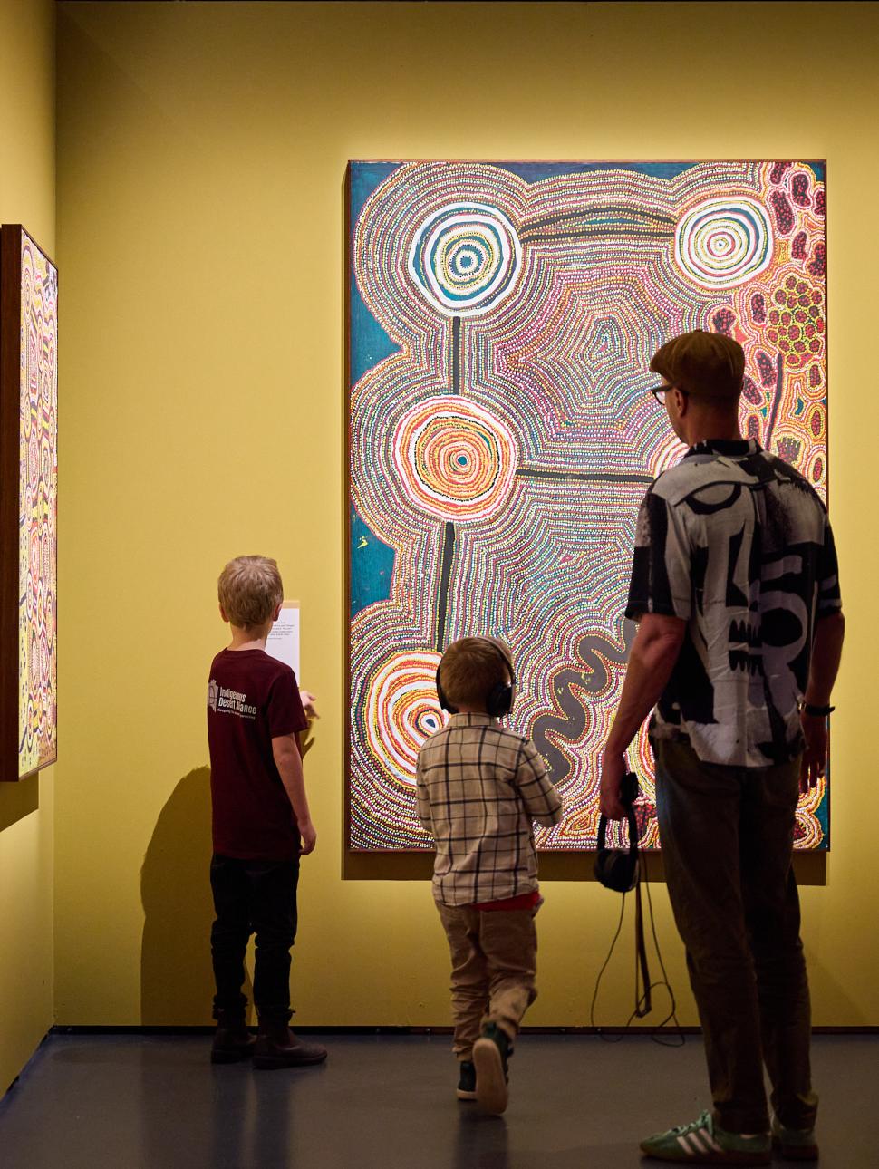 Family walking through an exhibition