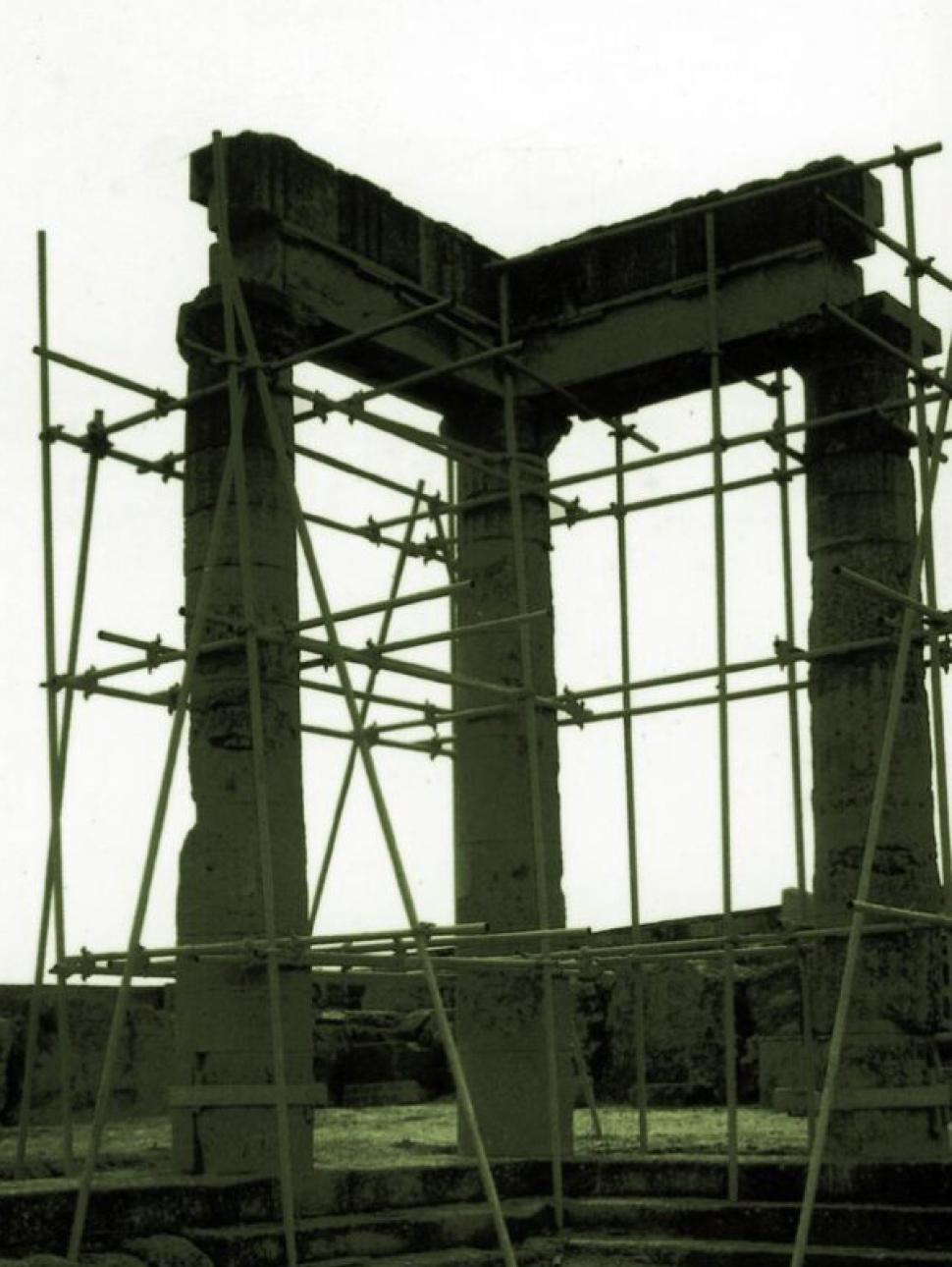 Cover image of Late Hybrids by Nikos Athanasou, showing ancient and crumbling classical Greek columns propped up by builder's scaffolding.