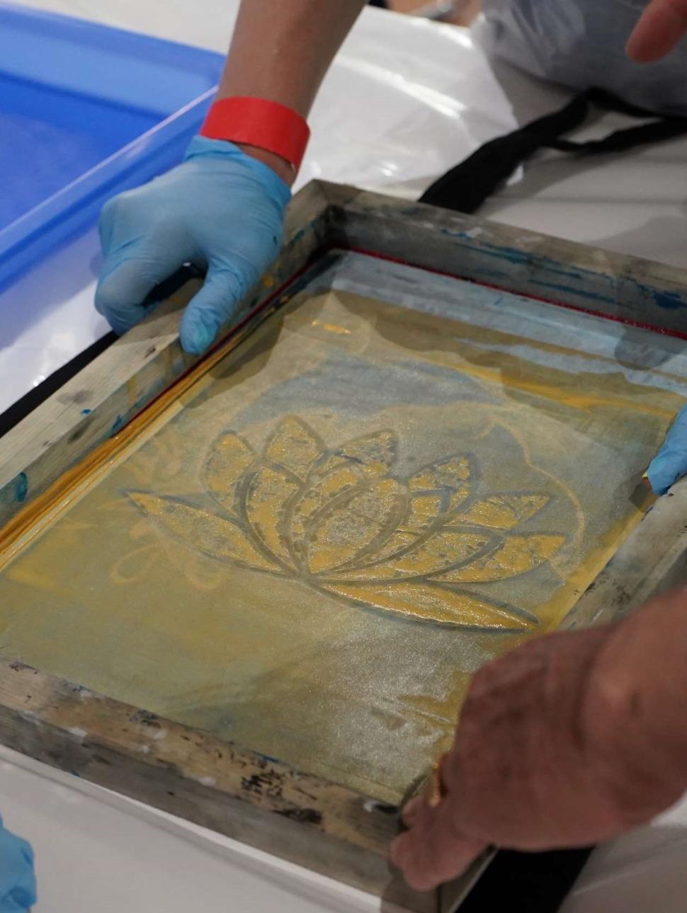 Screen printing stencil and frame in use