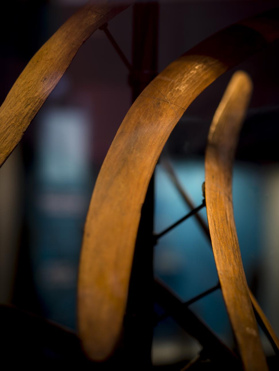 close up of artefacts made of wood in a display case