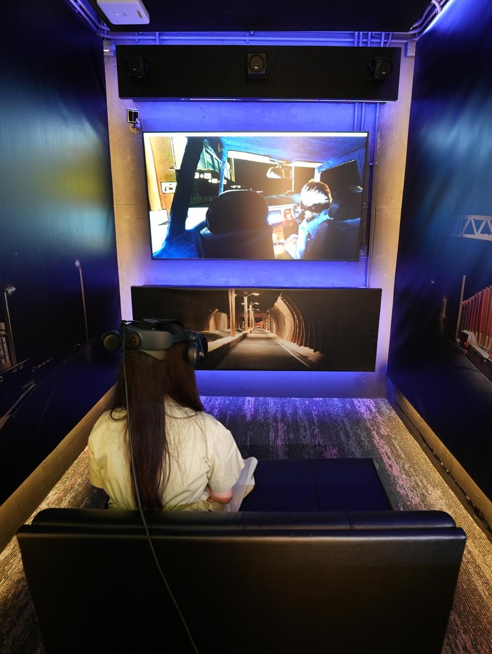Girl wearing VR headset watching Passenger