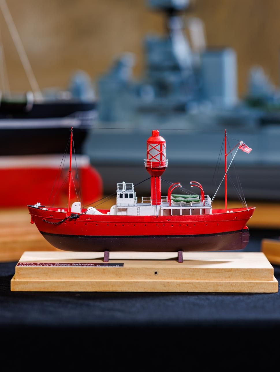 a model ship with others in the background