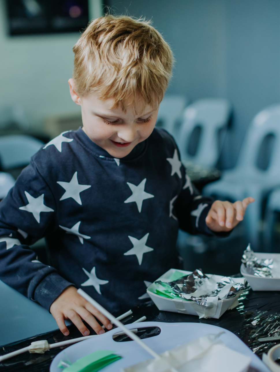 Child doing arts and crafts 