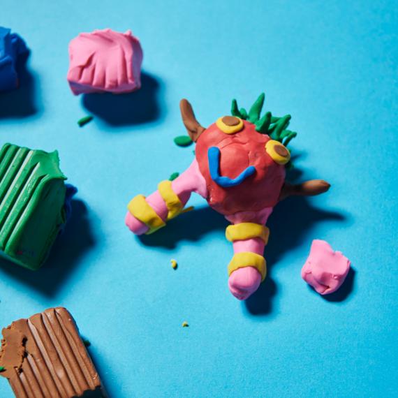 A colourful clay model of a creature