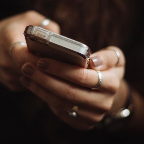 A person holding a mobile device