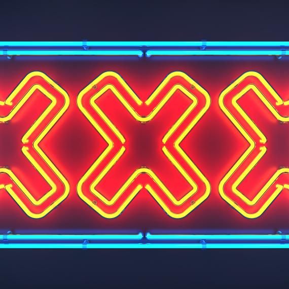 A neon sign with three X's