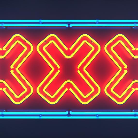 A neon sign with three X's