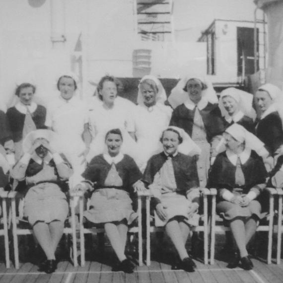 A black and white group photograph from the 1940s of nurses in uniform