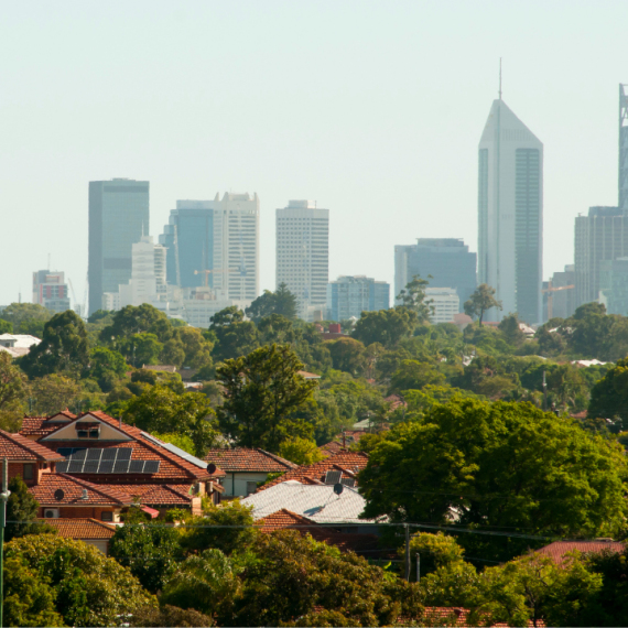A photograph showing Perth's city skyline and leafy suburb