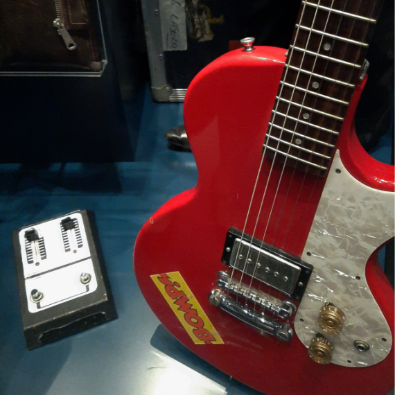 red guitar pictured in reflections gallery