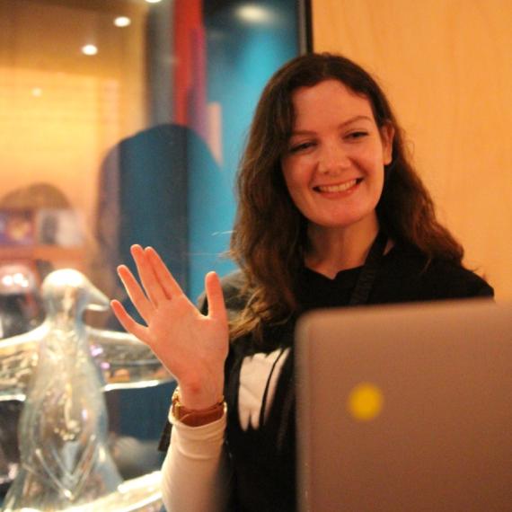 presenter with laptop in gallery 