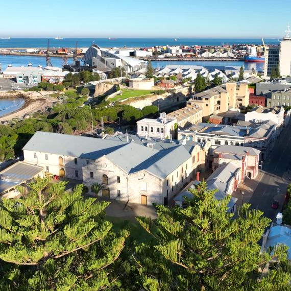 aerial view of Fremantle city with houses and landmarks. Harbour in the background