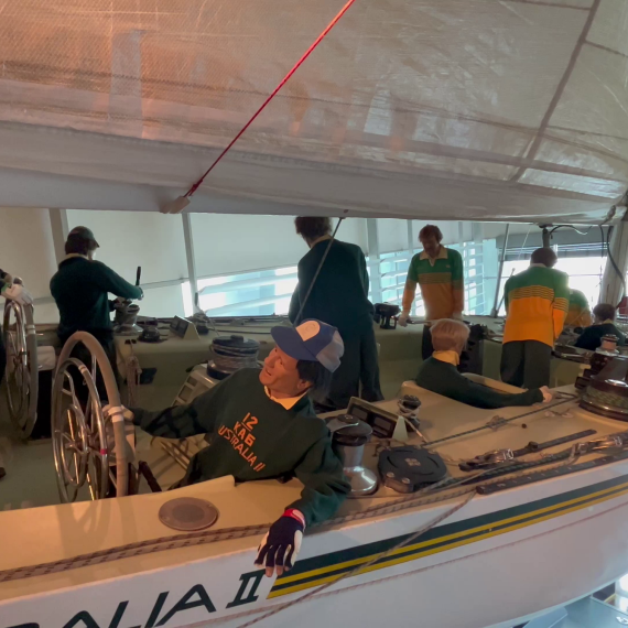 Australia II yacht with mannequins inside yacht to emulate the crew on board