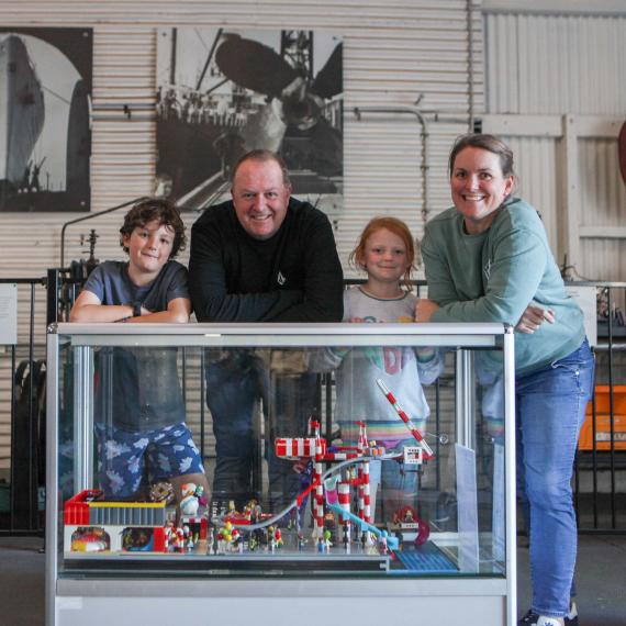 The designer of the Freo Builds 2023 LEGO display at WA Maritime Museum with family._with_family