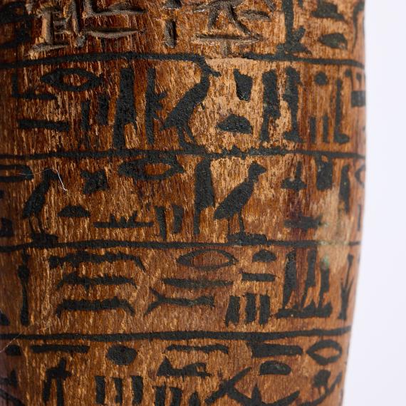 a close up of hieroglyphic symbols on a statue 