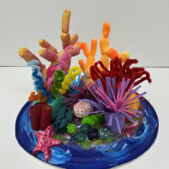 a colourful scuplture of coral using craft materials