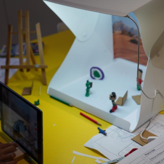 Clay characters with backdrop and iPad for filming