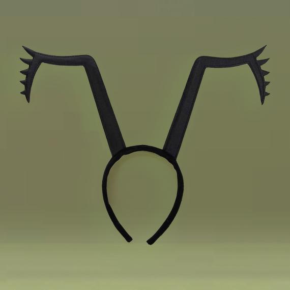 a black headband that has features of a bug