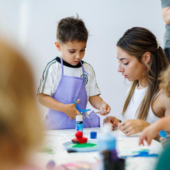 Small child doing arts & crafy