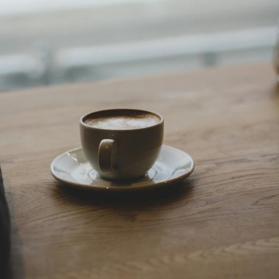 a cup of coffee on a saucer