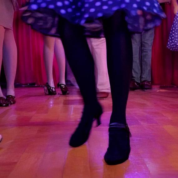 kids dressed in 1950s theme in a party dancefloor